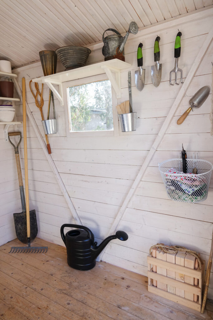 inside view of tools and supplies organized in gardening shed