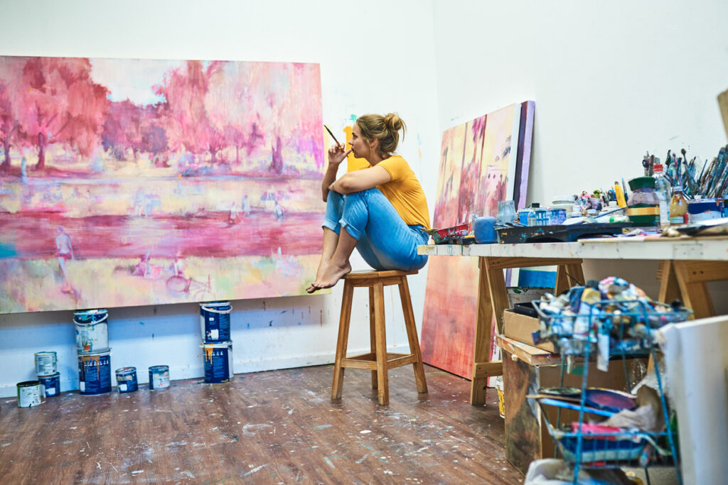 woman-painting-inside-art-studio